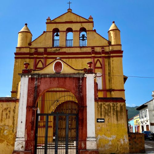 Old yellow building in San Cristobal
