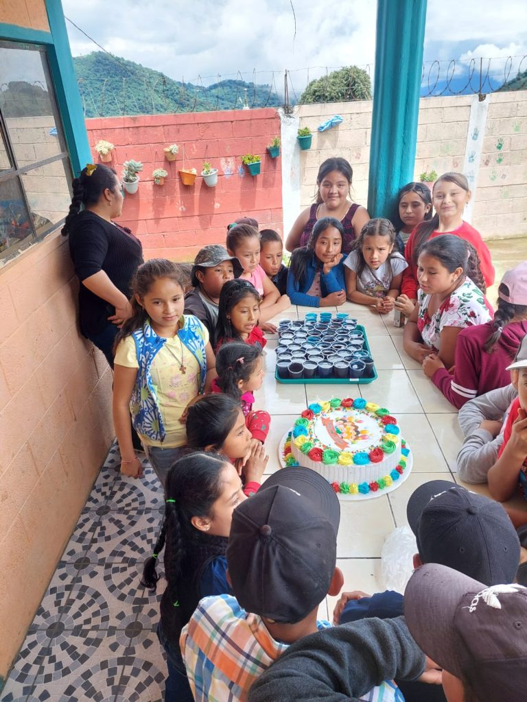 Children and staff together at the school